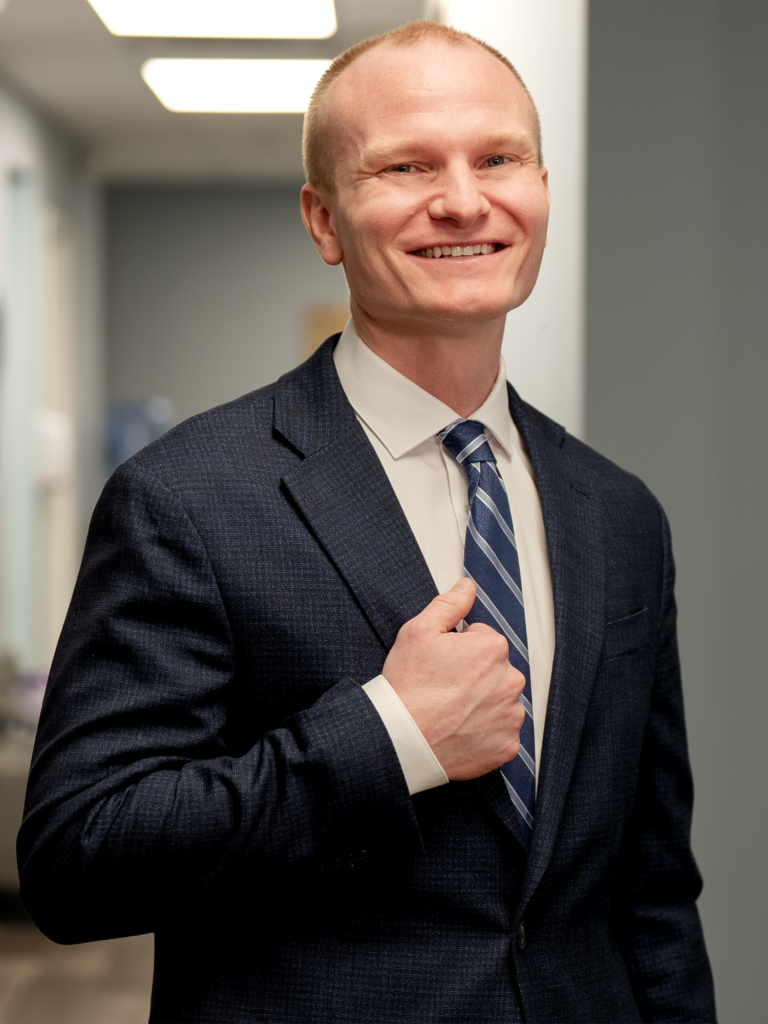 Dr. Zapoticky standing in his practice in suite